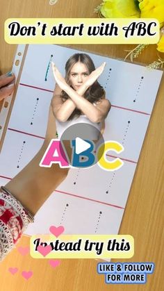 someone is holding their hand up to an ad for the abc show, don't start with abc