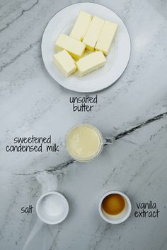 the ingredients to make butter on a marble counter top