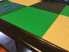 a table made out of legos is shown