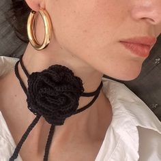 Hand crocheted rose choker. It is made with a lot of care and love. The material is a combination of 55% cotton and 45% acrylic. It's really soft and pleasant to the touch. Diameter of the flower is approximately 7cm. Length of the strand is 120cm 100% Vegan Materials It is made in 1 piece and is one of a kind. Suitable for all sizes, the size is easy adjustable. You can wear it as a bracelet also. Washable for easy care. It is best to hand wash at 30 degrees and lay flat to dry. Choker Crochet, Crochet Flower Necklace, Crocheted Rose, Rose Choker, Necklace Crochet, Choker Black, Flower Choker, Crochet Rose, Black Flower