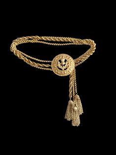 In excellent like New condition  gold color  size small, is 26"   3 strands and 3 tassels  The buckle is about 3 1/2" by 3 1/2" Gold Chain Belt, Scottish Thistle, Chain Belt, Suspender Belt, Gold Chain, Mint Condition, Gold Chains, Belts, Gold Color