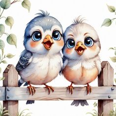 two little birds sitting on top of a wooden fence