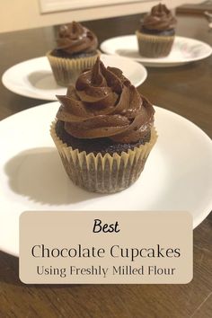 chocolate cupcakes on a plate with the words best chocolate cupcakes using freshly milled flour