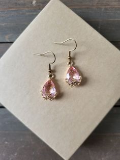 Beautiful sweet pink crystal diamond glass teardrop earrings with gold fastenings. Bold naturally inspired earrings with glittering fractals. Naturally colorful, and gently lightweight earrings ♥ Be sure to check out the PURPLE EARRINGS section at EarringsbyLCreations for all beautiful purple colored earrings available! https://www.etsy.com/shop/EarringsByLCreations?section_id=28420997 Made with quality materials and always nickel and lead free metals. Naturally colorful jewelry made by hand to complement your beauty.  Perfect gift for a friend or loved one: All jewelry pieces are packaged in jewelry boxes, wrapped in burlap ribbons and gold twine thread. Rustic wrapping for gift ready giving. Personalized gift messages available. See Gift Wrapping at checkout) STAY CONNECTED!! Follow and Pink Crystal Earrings, Colored Earrings, Crystal Teardrop Earrings, Purple Earrings, Earrings Diamond, Crystal Diamond, Earrings Crystal, Colorful Jewelry, Earrings Pink