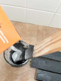 a close up of a toothbrush in a cup