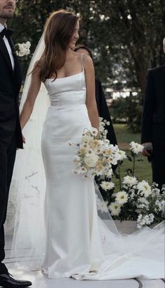 the bride and groom are walking down the aisle