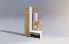 a wooden stand with a mirror and light on it's side, against a gray background