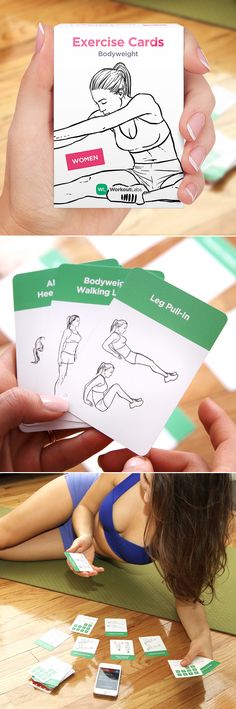 a woman is holding up some cards to show off her body