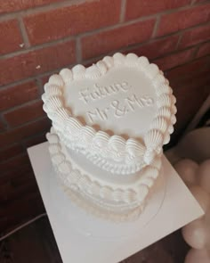 a heart shaped cake on top of a table