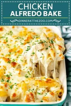 chicken alfredo bake in a blue casserole dish with a serving spoon scooping out