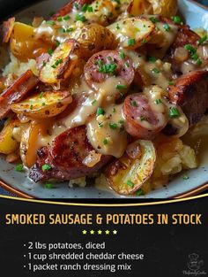 a plate with sausage and potatoes on it