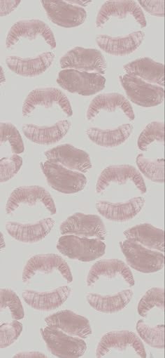 pink lipstick kisses on white background