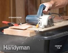 a person using a sander on a piece of wood