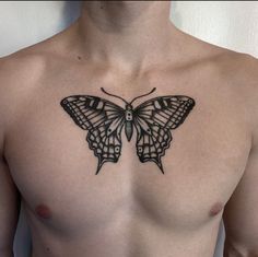 a man with a butterfly tattoo on his chest