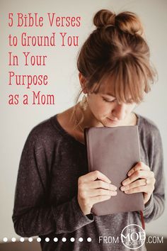 a woman looking at her tablet with the text 5 bible verses to ground you in your purpose as a mom