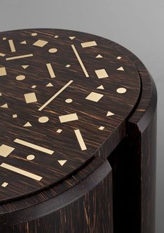 a wooden table with an intricate design on it