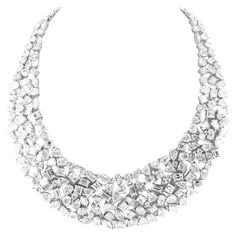 Introducing our magnificent Multi-Shape Diamond Necklace, a true masterpiece crafted in 18K white gold. This stunning necklace features an incredible 116 carats of mixed-shape diamonds, expertly arranged to create a dazzling display of brilliance. The combination of different diamond shapes adds a unique and captivating dimension to this luxurious piece, making it a perfect choice for those who appreciate both elegance and artistry. Elevate any occasion with this extraordinary necklace, designed to leave a lasting impression. White Gold Necklaces, Expensive Jewelry, Stunning Necklace, Fine Jewels, Multi Strand Necklace, Multi Strand, Diamond Shapes, Chains Necklace, Diamond Necklace