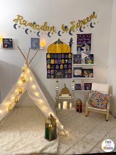 a teepee is decorated with lights and decorations