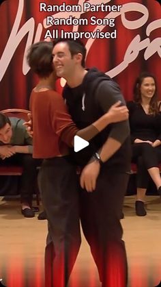 two people are dancing together in front of a red background with the words random partner random song all improvised