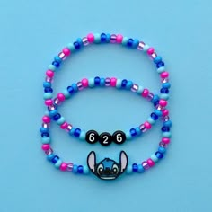 626 and Stitch bracelets! Please make your selection using the drop down menu. *Link to the Stitch daisies bracelet: https://www.etsy.com/listing/1745494665/ *Link to our Ohana bracelets: https://www.etsy.com/listing/1497342510/ Handmade with love using Czech glass beads, number beads, 3D printed Stitch bead and stretch cord. Get creative! All my bracelets are meant to be mixed, matched & stacked!  SIZING: Measure your wrist around the widest point and add .25-.5 inches to get the most comfortable or desired fit. If you don't have a flexible tape measure, you can use a piece of string to wrap around your wrist and then measure the length of the string. (For example: my wrist size is 6" and I will wear a 6.5" bracelet for a snug fit and 7" for a loose fit). CARE INSTRUCTIONS: Please be care Stitch Beaded Bracelet, Stitch Bracelet Ideas, Disney Friendship Bracelet Ideas, Lilo And Stitch Bracelet, Ohana Bracelet, Disney Bracelet Ideas, Disney Beaded Bracelet, Disney Friendship Bracelet, Disney Bracelets