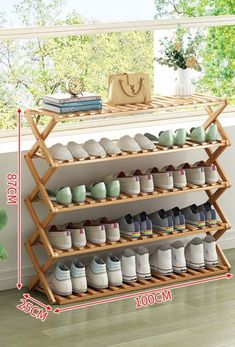 the shoe rack has many pairs of shoes on it