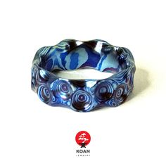 "This is a unique Titanium damascus forged ring, 2 or 3 grades of Titanium, 40 layers. Will gladly make a custom ring with your size. Koan mokume gane jewellery My name is Andrew Seginovich, designer, maker and creator of Koan Mokume gane Jewelry. Welcome to my shop! The studio was created in 2005, and since that time I've been seeking the most interesting, inspiring and beautiful designs to make you happy. I hope you will enjoy my work and I promise to do my best to make you satisfied. The main Forged Ring, Damascus Ring, Wooden Texture, Mokume Gane, Custom Ring, Unique Materials, Damascus, Custom Rings, I Promise