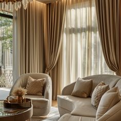 a living room filled with lots of furniture next to a window covered in drapes