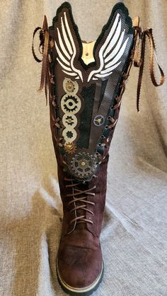 "These steampunk design boot extenders are made to lace into any front lacing knee boot. No damage to your boot! Price per pair. I have a girl who is like a daughter who has never been able to wear tall boots in her life. She has Goddess Calves and has never found a pair of even extra wide calf boots that will fit her.  So I came up with a solution for the Renaissance Faire!  These were added to x-wide boots to make Goddess Boots. But if you only needed extra wide, not Goddess- you could add these to ANY lace up front boot to make wide calf boots !  Finally- options! You will receive the pair pictured, although I can work up a custom design or colors. The boot pictured had a 3\" tongue.  The boot expander measures over 7\" at the top, AND you need more room, the lacing on the side so could Extra Wide Calf Boots, Steampunk Boots, Steampunk Design, Wide Calf, Wide Calf Boots, Boot Accessories, Wide Boots, Tall Boots, Ribbon Colors