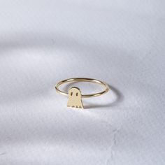 Tiny Ghost Ring, 14K 18K Real Solid Gold Ring, Minimalist Cute Spooky Halloween Ring, Personalizable Specter Ring, Halloween Gift  This ring is made to accompany you to your Halloween party👻 👻 DETAILS: - Gold Material: Solid Gold (no gold-filled or no gold plated material) - Gold Karat: 14K (%58,5), or 18K(%75) - Available gold color: Yellow Gold, Rose Gold, and White Gold 👻DIMENSIONS Ghost Height: 7.60 mm (0.29 inch) Ghost Width: 6.30 mm (0.24 inch) This is a handmade product so dimensions may vary. ✈️ SHIPMENT After your confirmation, I will ship your order in 1-3 business days. Estimated delivery time for UPS Express 3-4 business days. Please check your messages after your order for confirmation.  More for Initial & Name Ring  https://etsy.me/3rU1ccc Halloween Rings, Ghost Ring, Tiny Ghost, Fall Gift Baskets, Halloween Ring, Halloween Lovers, Name Rings, Solid Gold Ring, Party Details