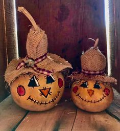 Scarecrow Gourds
Hard shell gourds decorated to look like scarecrows with burlap hats and painted faces Witch Gourd Painting, Pumpkin Gnome Painting, Painted Scarecrow Gourds, Painted Scarecrow Pumpkin, Scarecrow Pumpkin Decorating Ideas, Pumpkin Gourds Fall Decorating, Bushel Gourd Crafts, Fall Painted Gourds