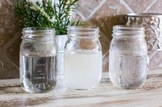 three mason jars filled with salt and water