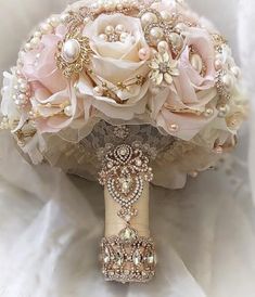 a bridal bouquet with pearls and flowers