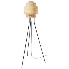 the floor lamp is made out of straw