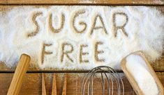 sugar free written in flour next to kitchen utensils