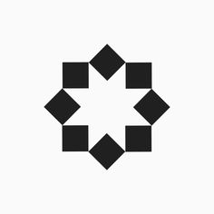 an abstract black and white logo with four rectangles in the shape of squares