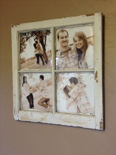 an old window with four photos hanging on it