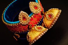 *****The price mentioned is for a pair of jhumkas***** Well designed and ornated silk thread jhumkas that come in various colors, color combinations, patterns and designs. I can try and make the designs to your liking if you specify a specific color or design pattern. As I can make these Festival Bra, Festival Captain Hat