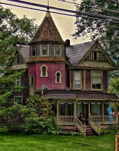 an old victorian style house in the country