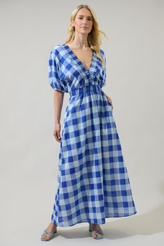 Have cheerful days when you wear this adorable midi dress! A plaid pattern throughout dazzles along a ruffle trim deep v-neckline with elastic at the border. Long bubble sleeves end with elastic cuffs. Easy to pair up with white heels and some silmple jewelry. - Lined- Pockets- Ruffles- Plaid- Color: Blue-multiSize + Fit - Model is 5'8" and wearing size XS- Measurements taken from size S - Waist: 13 1/2"- Length: 55" Fabric Self:50%Polyester 50%Cotton, Lining:97%Polyester 3%Spandex Style Number Bra Dress, V Neck Midi Dress, Tiered Midi Dress, White Heels, Body Dress, Curve Dresses, Long Sleeve Maxi, Blue Midi Dress, Long Sleeve Maxi Dress