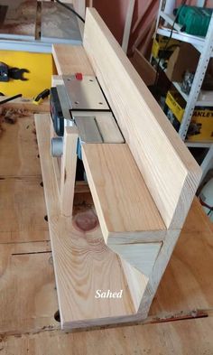 a wooden bench being built in a workshop