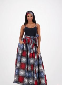 Introducing the Ankara Maxi Skirt - a stunning addition to any wardrobe. This skirt features a vibrant Ankara print, elevating any outfit with its unique and bold design. Crafted with premium materials for a luxurious feel, this skirt will make you feel like a fashion icon. Embrace sophistication and style with the Ankara Maxi Skirt.  Fits up to 2X. Made of 100% cotton. 42" inches long in length. Multicolor Printed Long Skirt, Flowy Multicolor Printed Maxi Skirt, Ankara Fitted Skirt, Ankara Long Skirt Styles, Ankara Skirts Designs, Ankara Wrap Skirt, Maxi Skirt Fits, Ankara Maxi Skirt, Ankara Skirt Styles