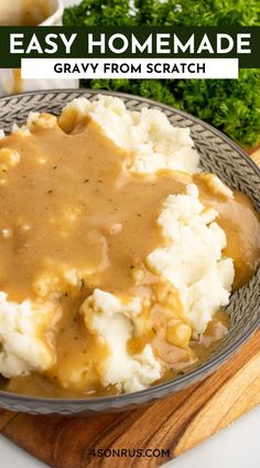 a bowl filled with mashed potatoes and gravy