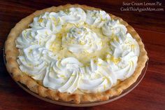 a lemon pie with whipped cream on top