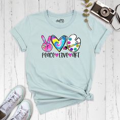 Peace Love Art Shirt, Paint Lover Gift, Art Teacher Shirt, Christmas Gift, Painter Tee, Peace T-Shirt, Art Lover Shirt Our products are Bella+Canvas branded. If Bella+Canvas is out of stock, I will send it from a trusted brand of the same size and quality. You can contact us in case of any problem or request. If you purchase a custom product, I will send you a message to confirm the design, don't forget to check your message box. Your satisfaction is important to us :) Please check the size char Art Teacher Shirts Designs, Art Teacher Shirt, Art Teacher Shirts, T Shirt Painting, Concert Shirts, Teacher Tshirts, Art Shirts, School Shirts, Teacher Shirts