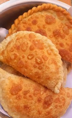 two pieces of fried food in a bowl