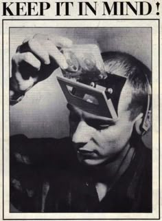 an old newspaper article with a man holding a tape recorder in front of his face