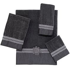 four piece towel set in dark grey with silver trimmings and an embroidered flower on the front