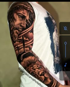 a man with a cross and lion tattoo on his arm