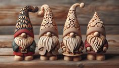 three wooden gnome figurines sitting next to each other