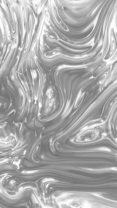 an abstract silver background with wavy lines